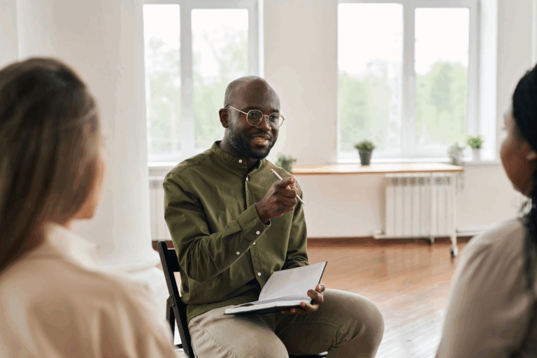 A health and wellness coach goes over an action plan to improve their daily lives.
